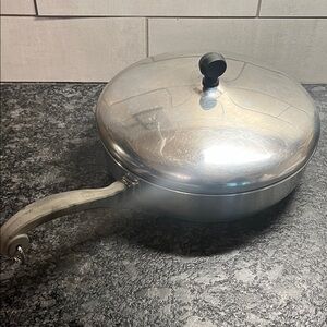 Vintage Farberware 10” Stainless Steel Frying Pan with Lid. Excellent condition.